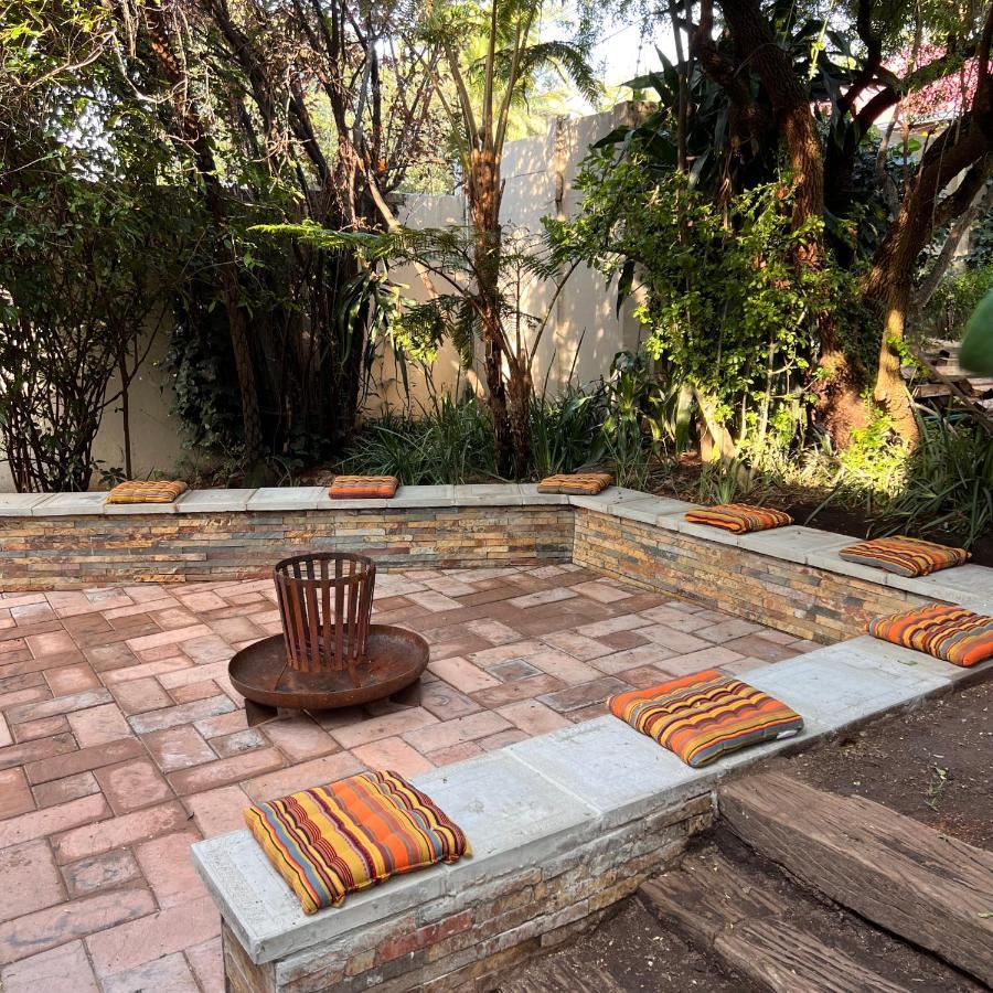 Apartamento Peaceful@Swansea In Rosebank-Parkwood Johannesburgo Exterior foto